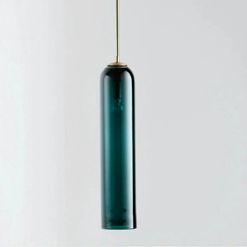 A sleek teal glass pendant light with brass metal rod and cap from decorbites led glass pendant chandelier collection