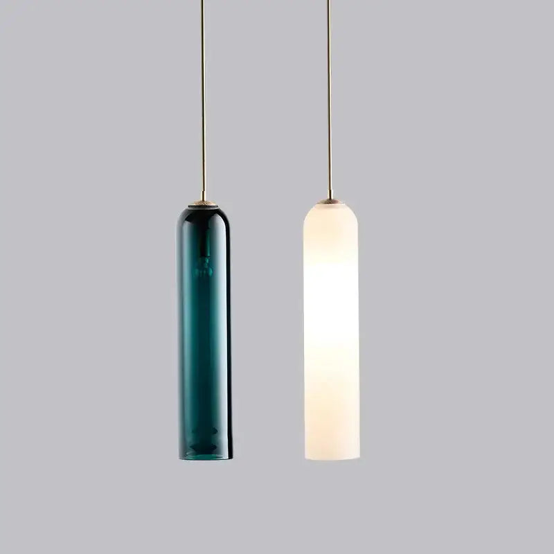 Two DecorBites™ LED glass pendant chandelier lights with deep teal and white frosted glass shades for kitchen or bar decor