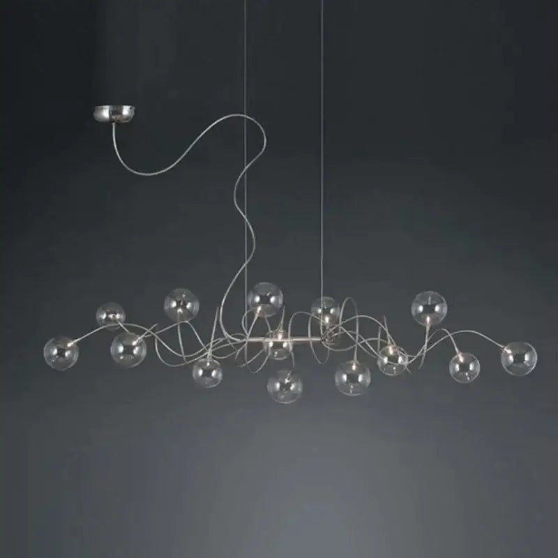 Modern silver-toned decorbites led glass pendant chandelier with clear glass spheres for living room or dining use