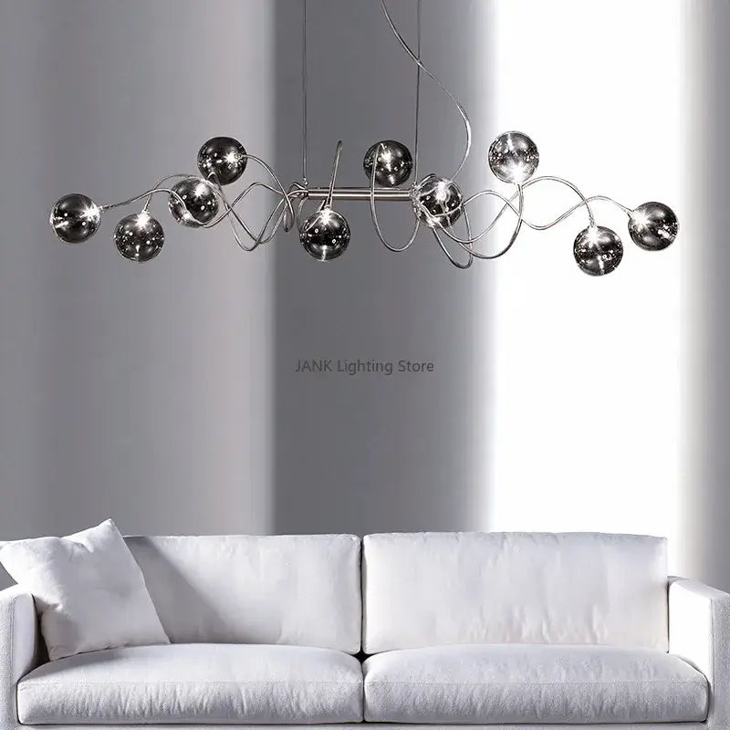 Modern chrome-finished decorbites led glass pendant chandelier with reflective spherical bulbs for living room and dining use