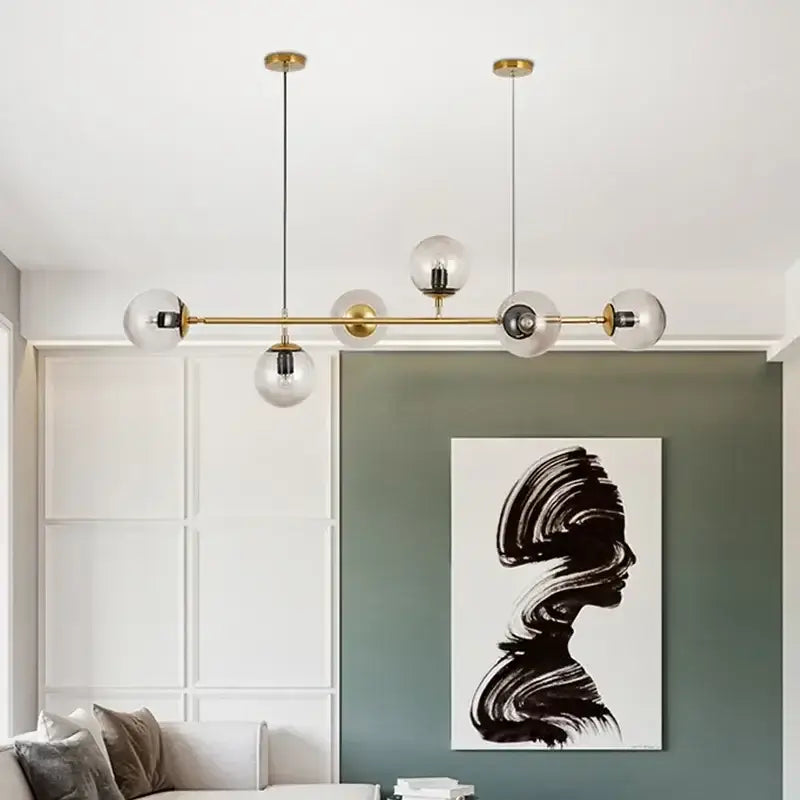 Modern brass and glass decorbites led glass pendant chandelier with clear spherical bulbs for dining room and bedroom decor