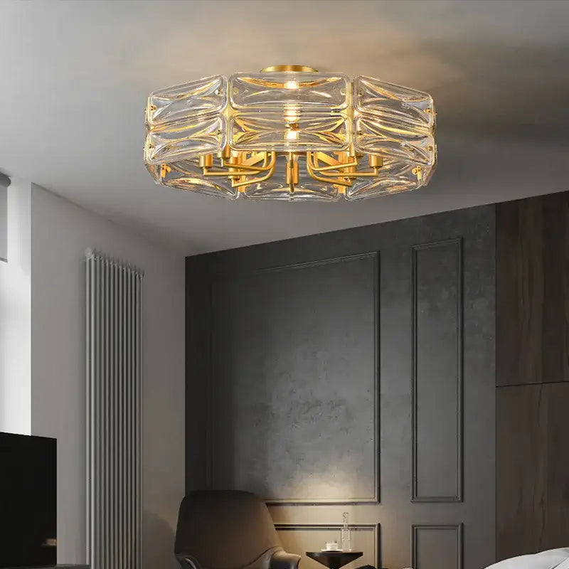 A modern decorbites led glass pendant light with geometric crystal design and gold-toned accents for kitchen island