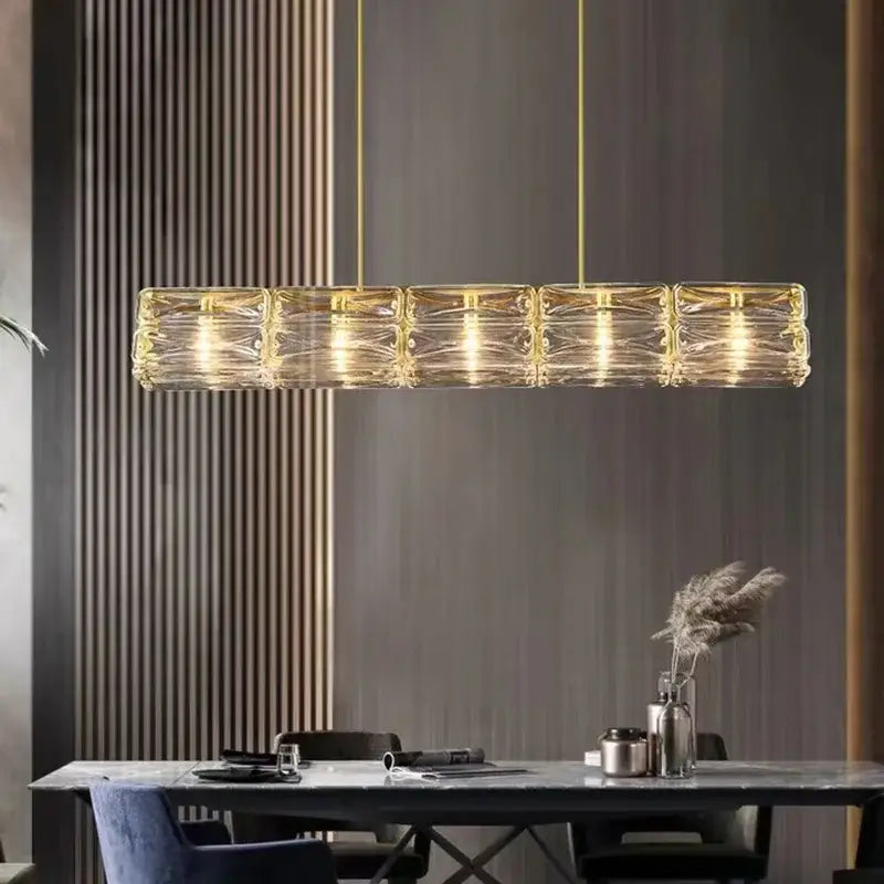 Gold-toned decorbites led glass pendant light with clear faceted glass and modern geometric design for kitchen island decor