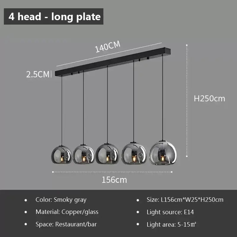 Smoky gray DecorBites™ LED glass pendant light featuring four spherical shades on a modern black copper plate