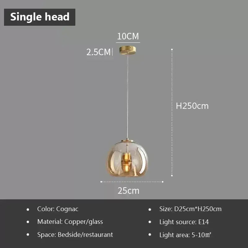 Decorbites led glass pendant light with cognac-colored glass and copper finish designed for bedside or restaurant use
