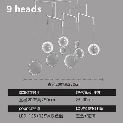 Modern minimalist decorbites led glass pendant light with nine spherical orbs and polished brass frame for hall or living room