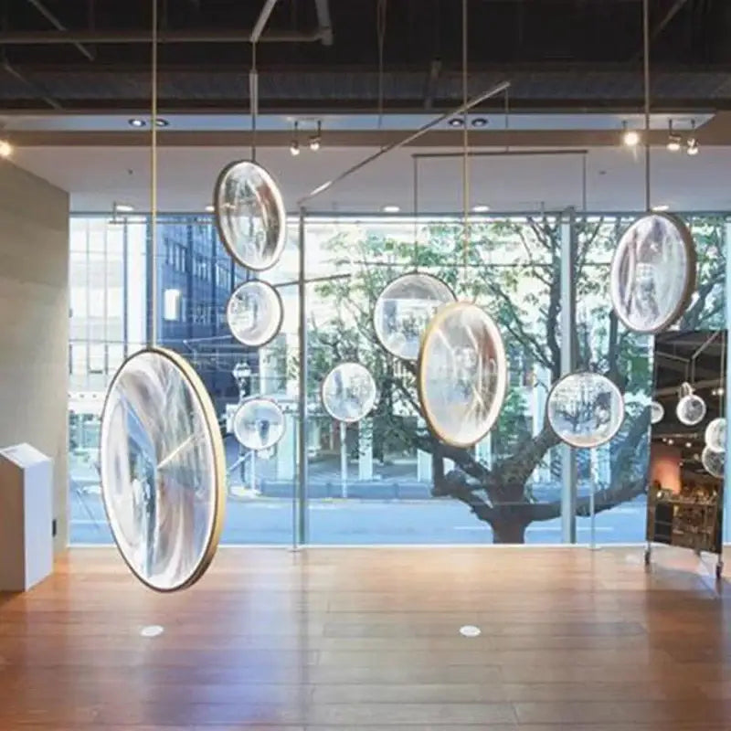 Sleek circular decorbites led glass pendant light with reflective glass and gold frame for hall living room restaurant