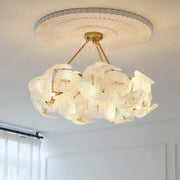 Elegant gold-toned decorbites led glass petal chandeliers with intricate translucent glass petals for dining table lighting