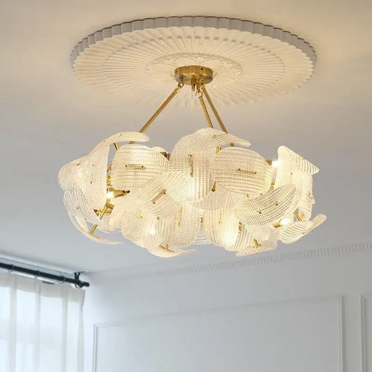Elegant gold-toned decorbites led glass petal chandeliers with intricate translucent glass petals for dining table lighting