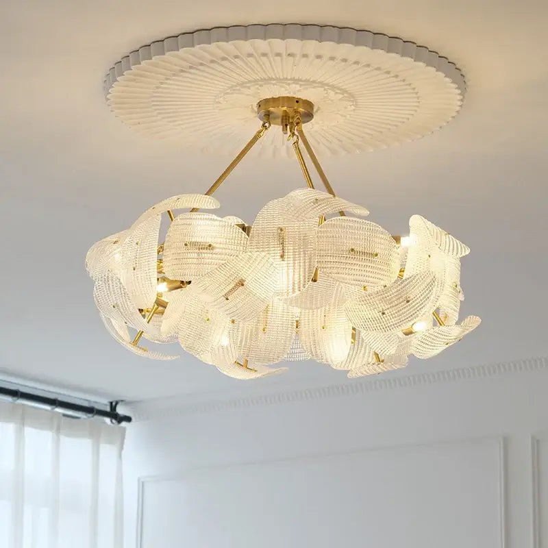 Elegant gold-toned decorbites led glass petal chandeliers with intricate translucent glass petals for dining table lighting