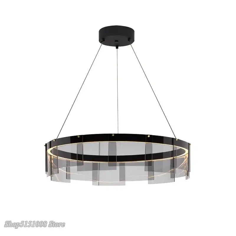 Modern black circular pendant lights with transparent glass panels and glowing led glass ring by DecorBites LED Glass