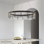 Modern circular DecorBites LED glass ring pendant lights with a sleek black iron frame and warm LED lighting for home décor