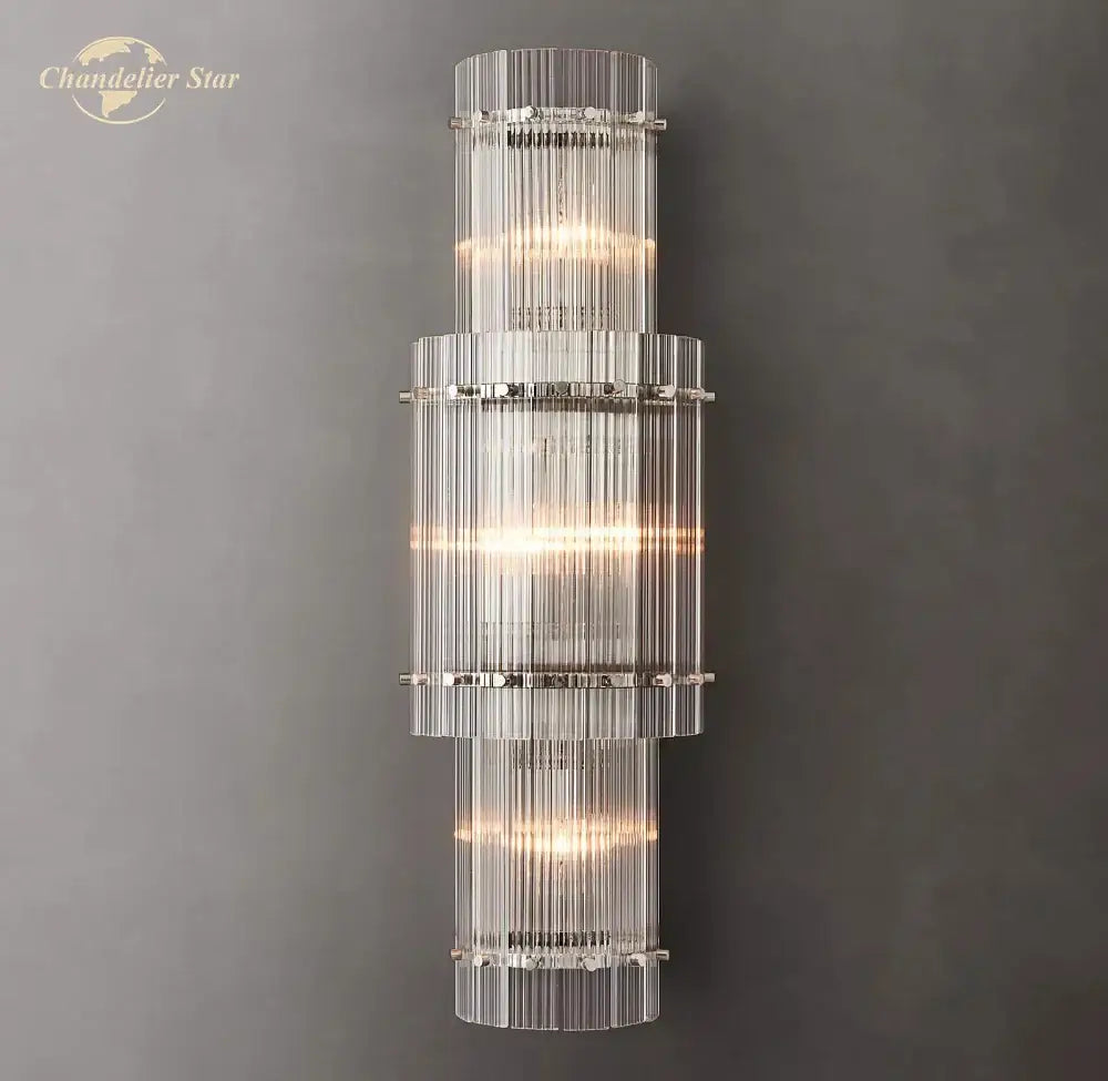 Clear glass cylinder wall lamp with vertically ribbed sections and metallic accents decorbites led glass san marco design