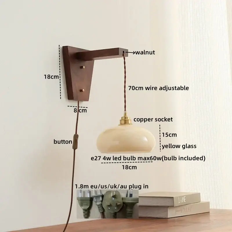 Warm-toned translucent yellow glass pendant wall lamp with brass socket and walnut bracket decorbites led glass sconce
