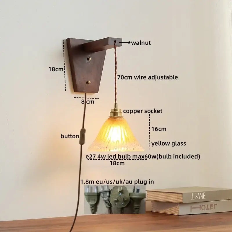 A warm yellow glass pendant wall lamp with walnut mount and copper socket featuring an adjustable 70cm wire from decorbites led glass sconce