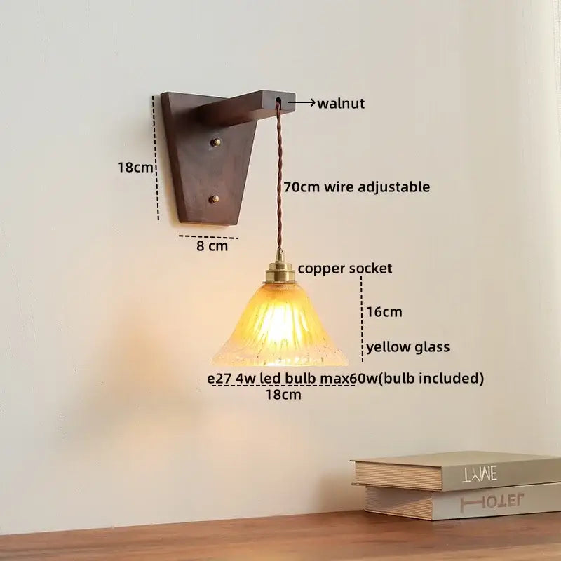 A warm yellow glass wall lamp with walnut mount and copper socket decorbites led glass sconce stair light fixture