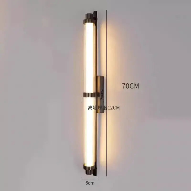Modern 70cm decorbites led glass wall lamp with warm glowing cylindrical glass and brushed brass fixtures for living room