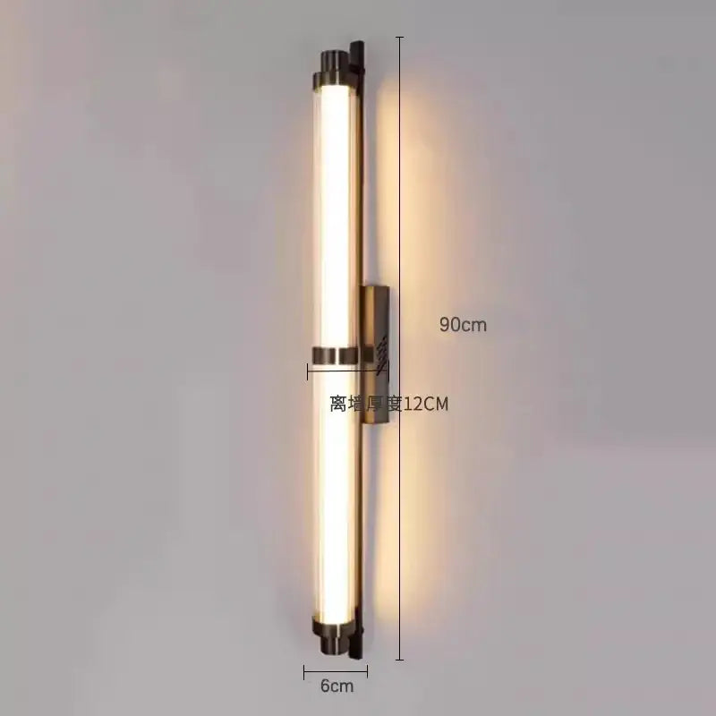 Modern minimalist decorbites led glass wall lamp with frosted cylindrical tube and brushed brass accents for living spaces