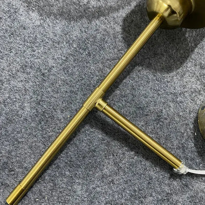 Brass-finished t-shaped wall lamp base with sleek polished metal rods for decorbites led glass wall lamp design