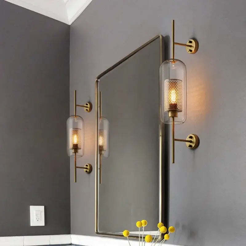 Brass-finished decorbites led glass wall lamp with cylindrical perforated mesh glass shades for modern bedroom decor