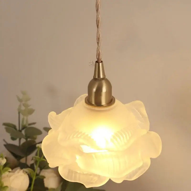 DecorBites led glass wall lamp with frosted rose-shaped glass pendant and brass-finished metal fixture for bedroom use