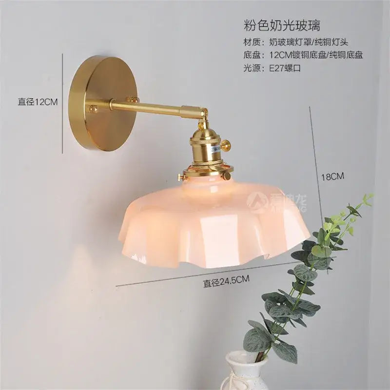 Delicate pink frosted glass lampshade with fluted design on brass arm in decorbites led glass wall lamp for living room