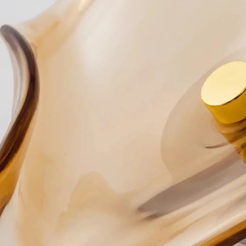 DecorBites™ led glass wall lamp with a translucent amber glass body and polished gold cap wall lamp design