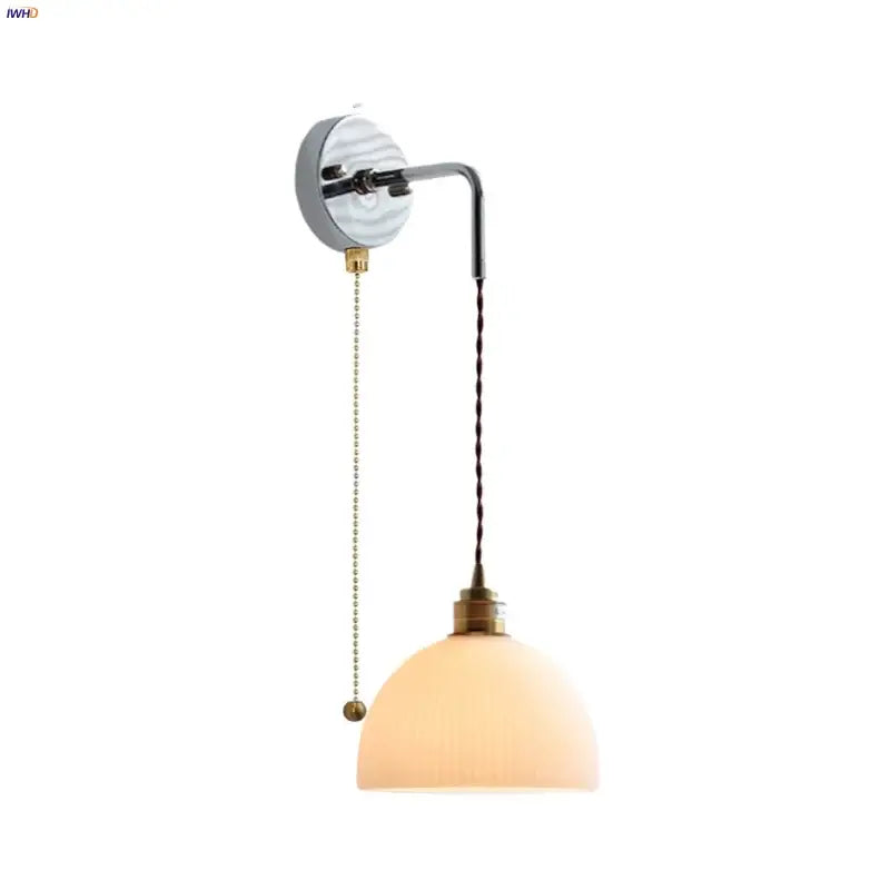 Vintage-style DecorBites LED glass wall light with brushed brass finish, off-white ribbed glass shade, and twisted black cord