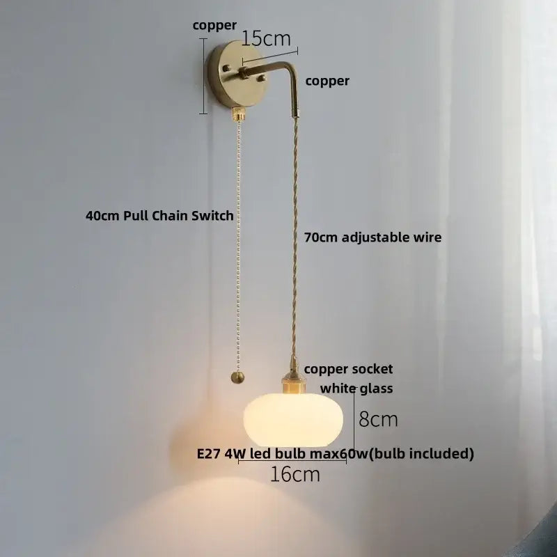 Copper-finished DecorBites LED glass wall light with white glass globe and adjustable 70cm wire for bedroom use