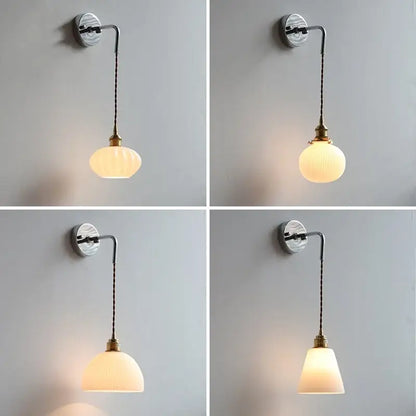 Vintage-style DecorBites LED glass wall light with curved metal arm and frosted glass shades for bedroom or study use
