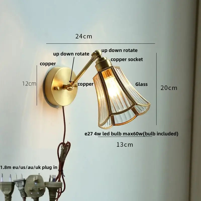 Brass-finished adjustable wall light fixture with fluted glass shade and copper socket for modern living room or bar use
