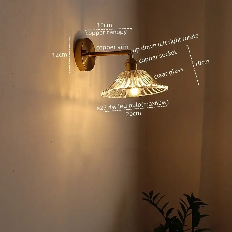 Copper-finished DecorBites LED glass wall lights with clear fluted glass shade and adjustable arm for modern decor