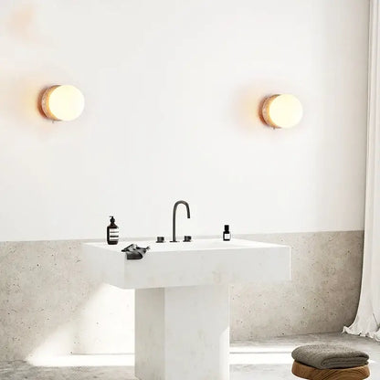 Minimalist decorbites led glass wall lights with warm diffused light and natural wood base for restaurant living room