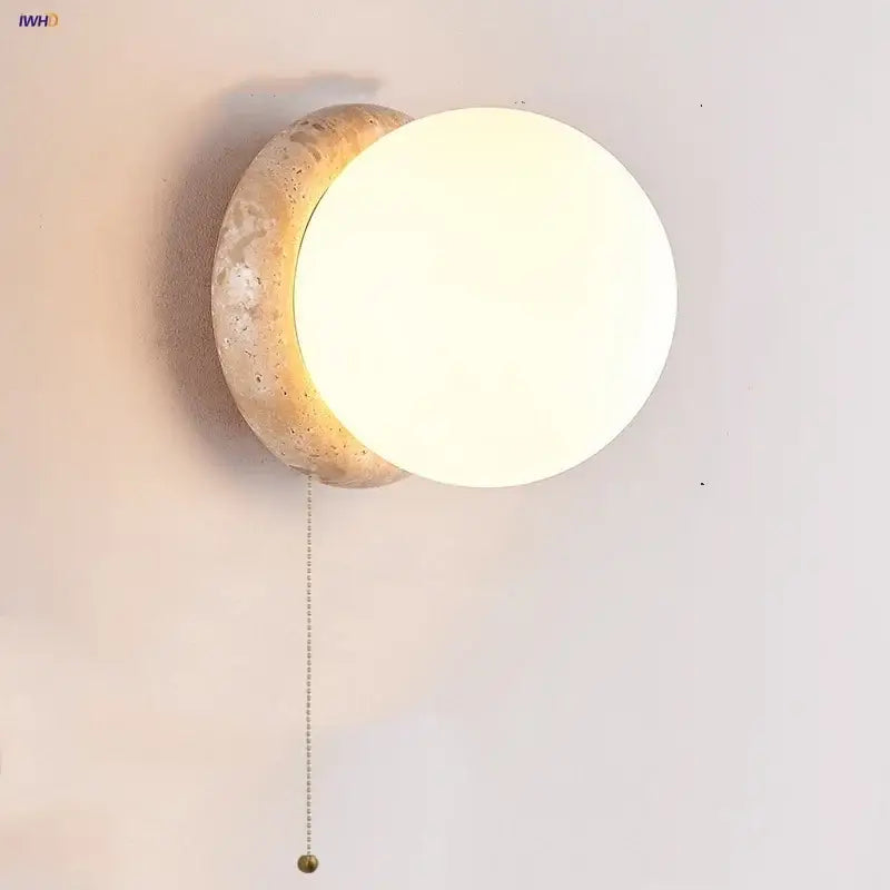 Decorbites led glass wall lights with beige stone base and frosted white spherical shade with brass pull chain for living room