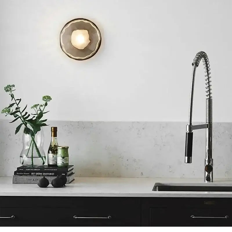 Decorbites led glass wall sconce with a circular warm glowing textured glass shade for living room lighting