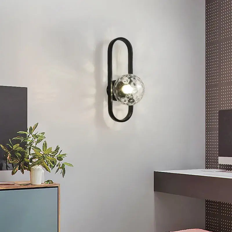 Decorbites™ black metal wall sconce lamp with textured clear glass globe for bedroom and living room lighting
