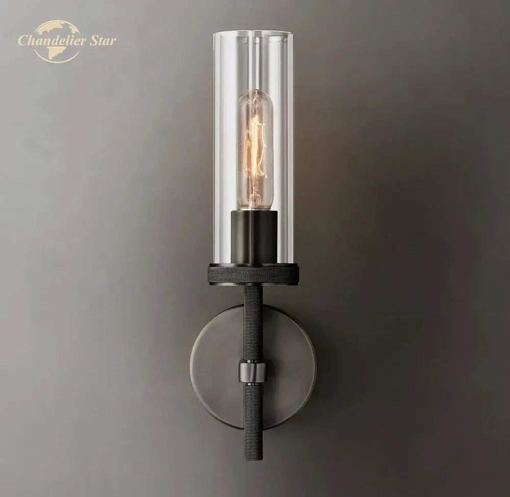 DecorBites™ LED glass wall sconce with clear glass cylinder and black metal base for modern indoor lighting