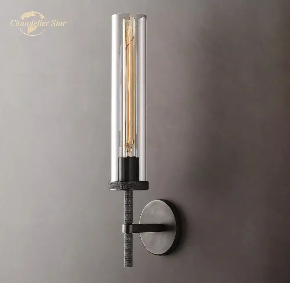 DecorBites LED glass wall sconce with clear glass cylinder and matte black metal base for modern indoor lighting