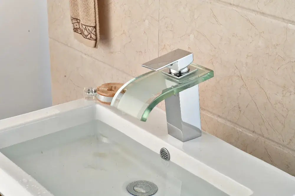 Modern chrome and glass decorbites led glass waterfall basin faucet with sleek curved design for bathroom sink mixer