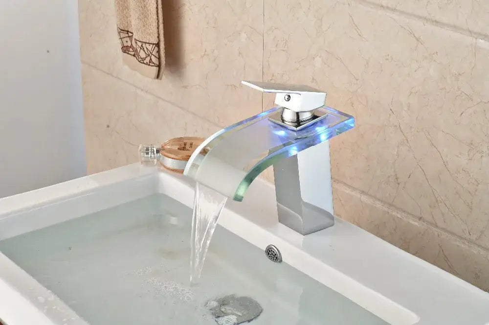 DecorBites led glass waterfall basin faucet with square chrome single handle and blue led lighting for bathroom sink