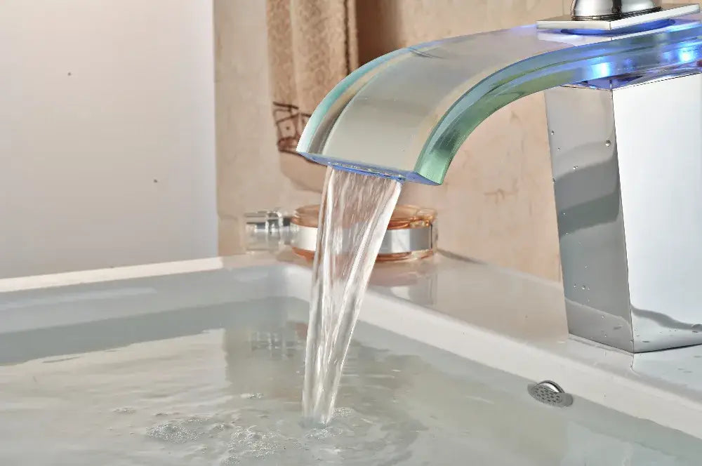 Modern chrome decorbites led glass basin faucet with curved spout and blue led glass waterfall lighting for bathroom sink