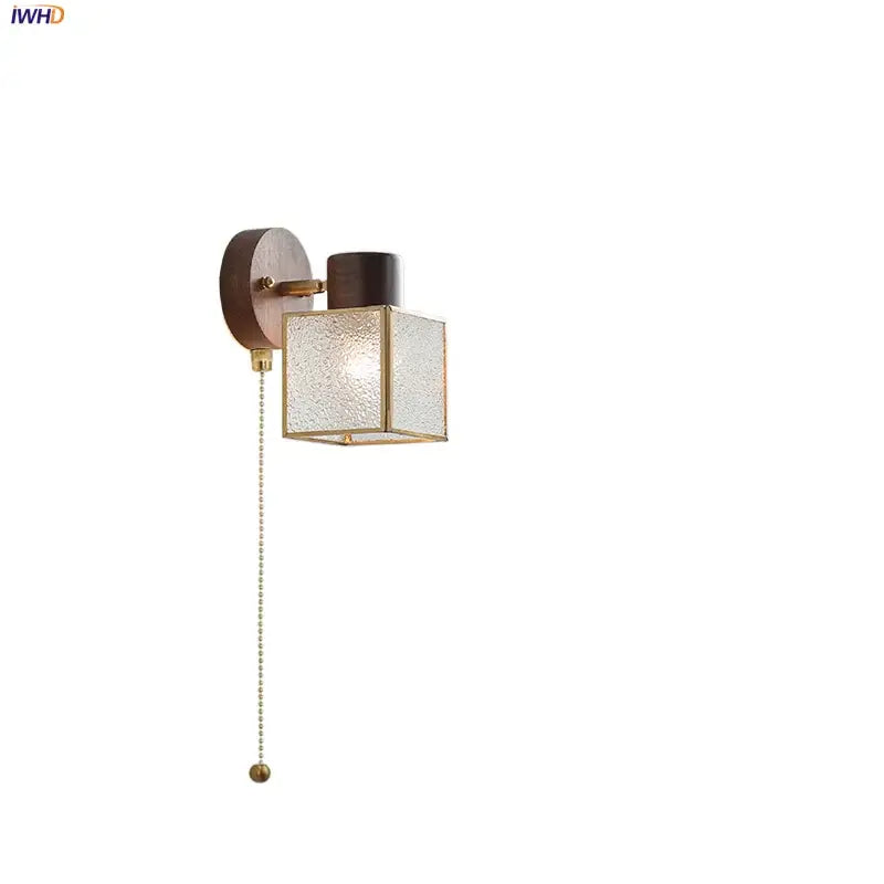 DecorBites™ LED glass and wood wall lamp with dark wood backplate brass accents and textured glass cube shade