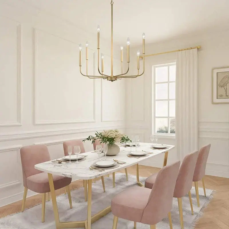 Gold-toned decorbites led gold and black candle chandelier with multiple bulbs hanging above dining table