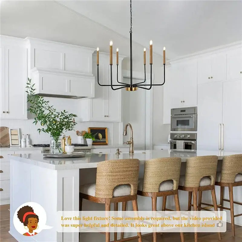 DecorBites led gold and black candle chandelier with six brass arms hanging above a kitchen island