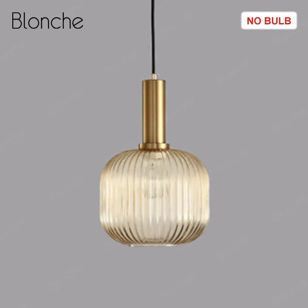 Blonche pendant light with gold-toned metal stem and ribbed glass shade from decorbites led gold chandelier collection