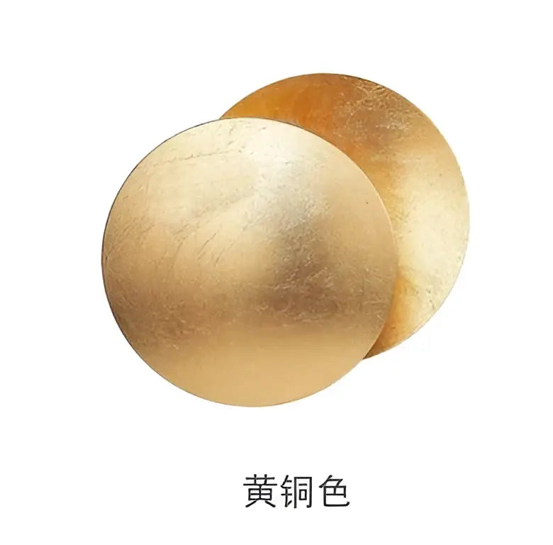Decorbites led gold eclipse wall lamp with two overlapping warm metallic gold discs and textured surface for bedroom
