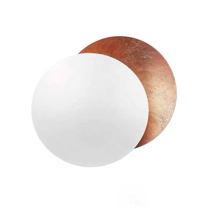 Minimalist DecorBites LED Gold Eclipse wall lamp with overlapping matte white and textured copper discs for bedroom