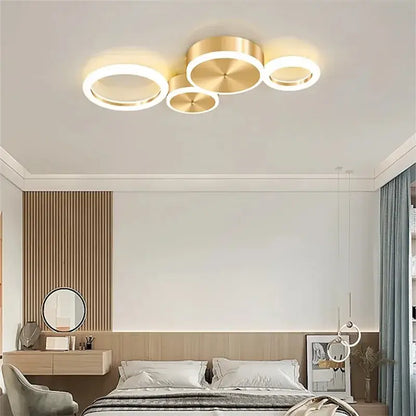 Modern gold-toned circular ceiling light fixture with sleek minimalist design decorbites led gold ring chandelier