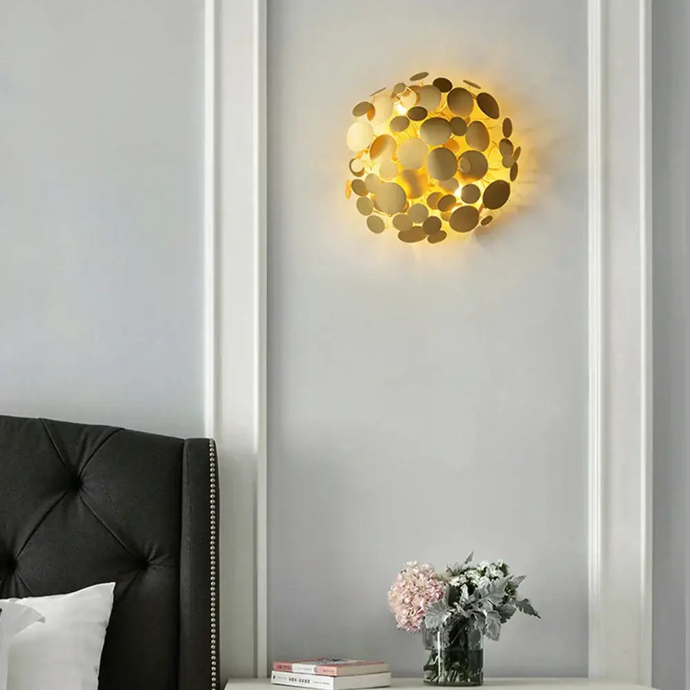 Gold-toned spherical DecorBites LED golden maple wall sconce with modern layered circular discs for bedroom and corridor