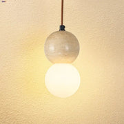 Decorbites led gourd pendant light with two stacked spheres in textured concrete and frosted glass hanging from brown cord